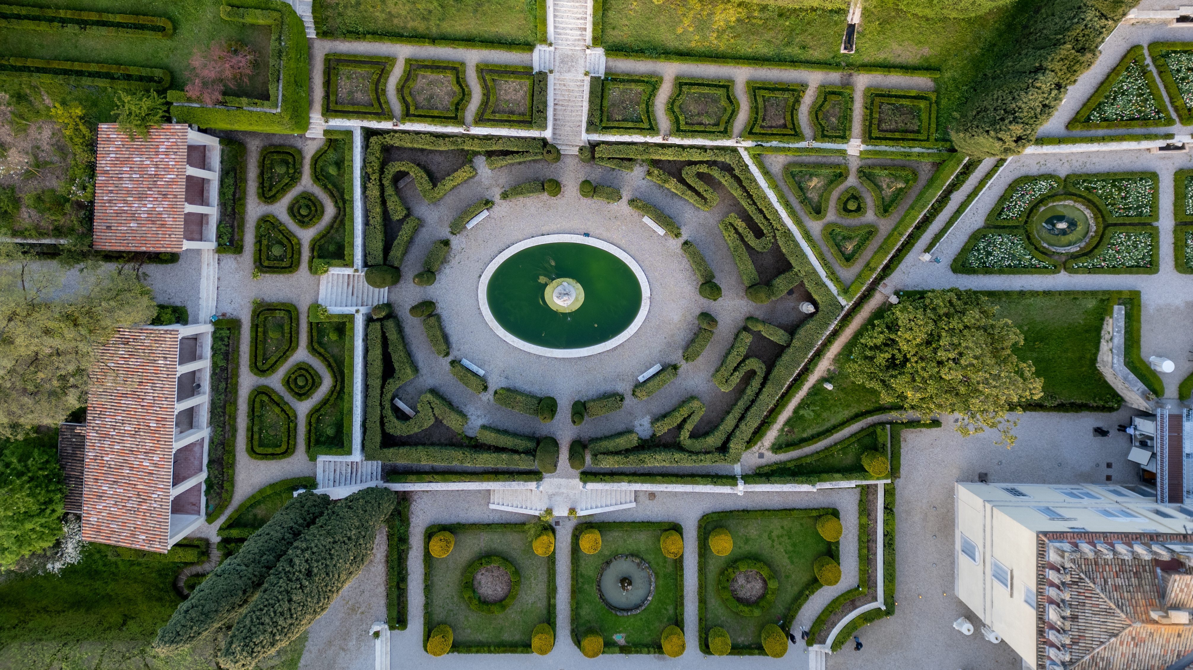 Aerial view of Pojega Garden showcasing the geometric parterre of the Italian formal garden designed by Luigi Trezza.
