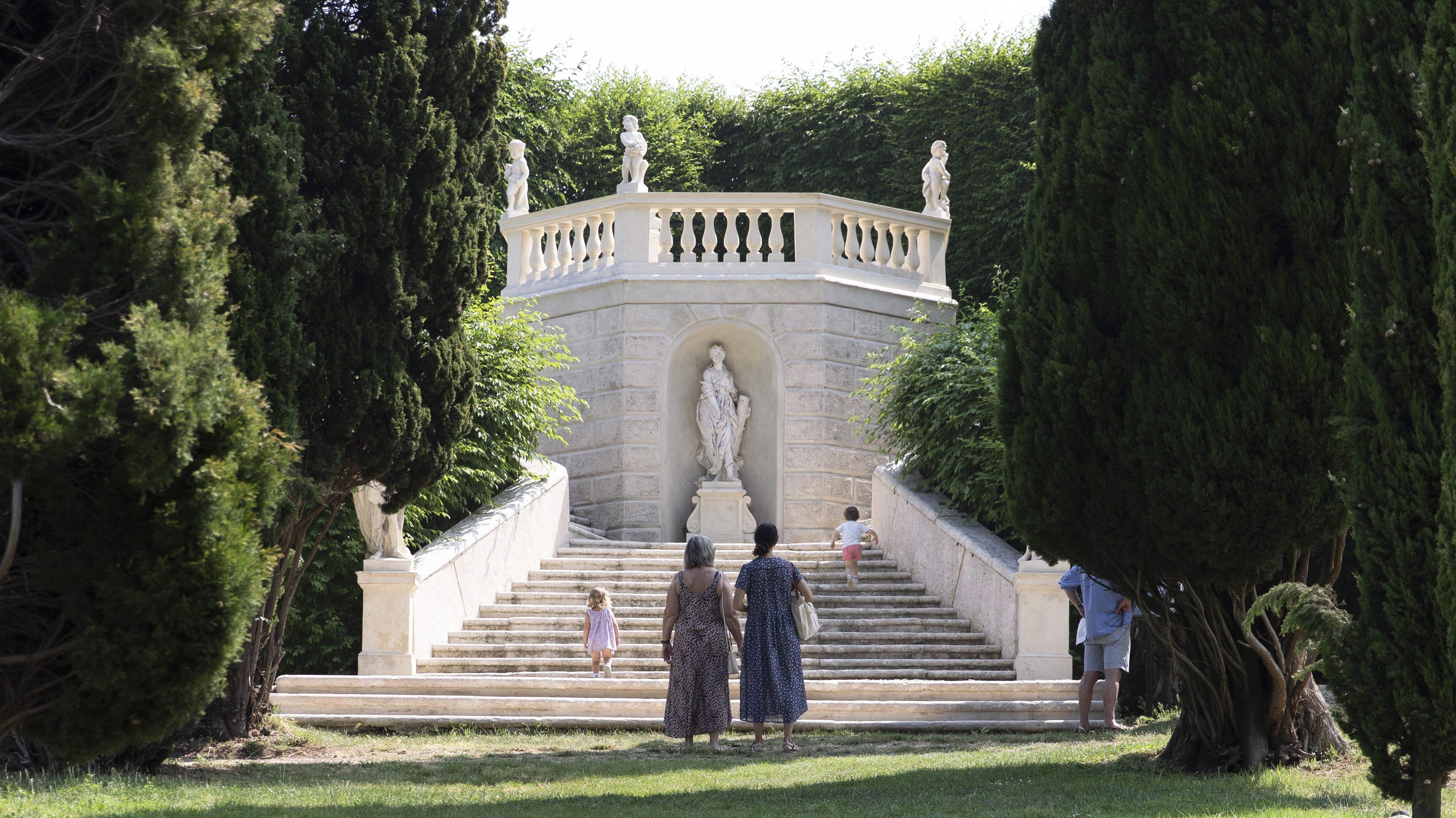 Visitors enjoying the panoramic view over Valpolicella from the Belvedere at Pojega Garden, designed by Luigi Trezza.